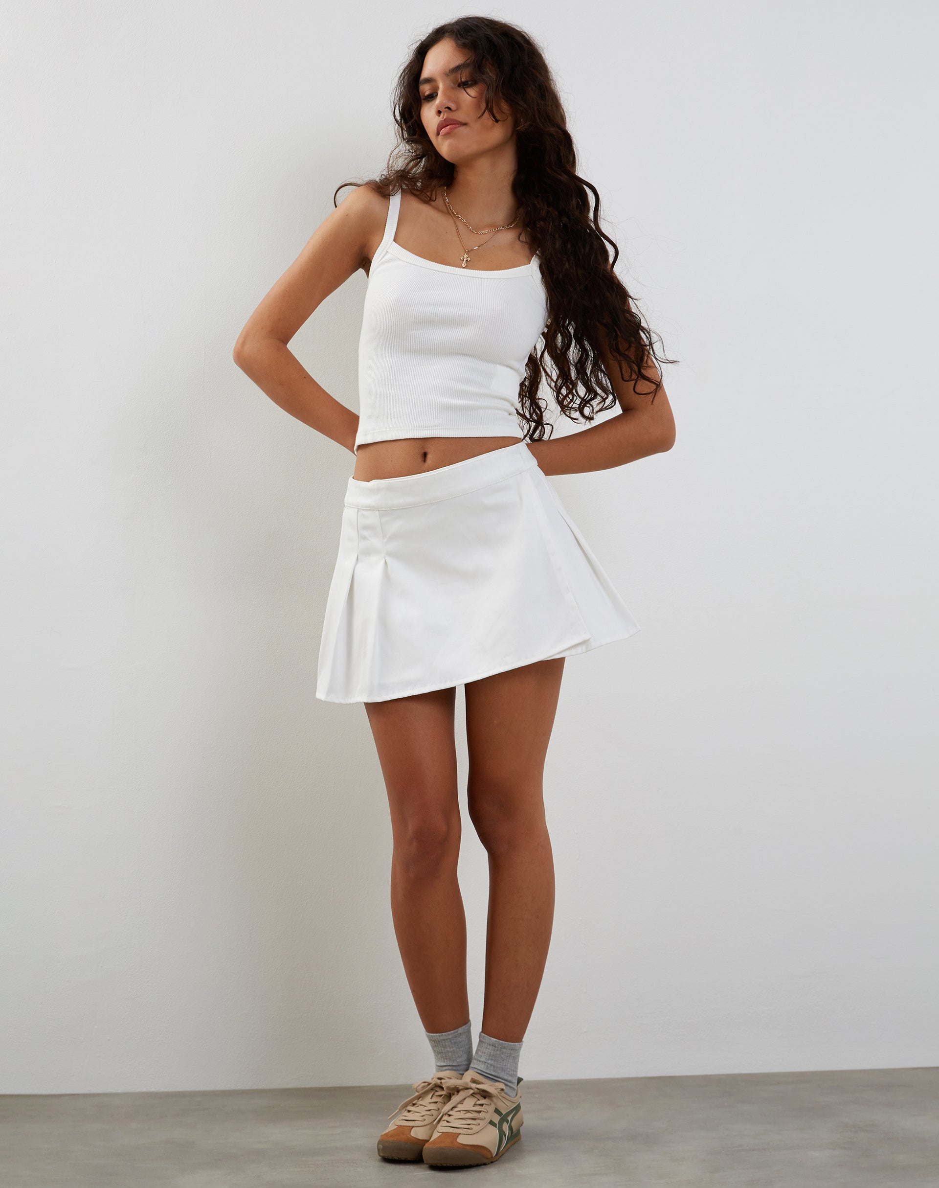 White pleated store mini skirt