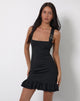 Image of Jessa Ruffle Hem Buckle Strap Mini Dress in Black