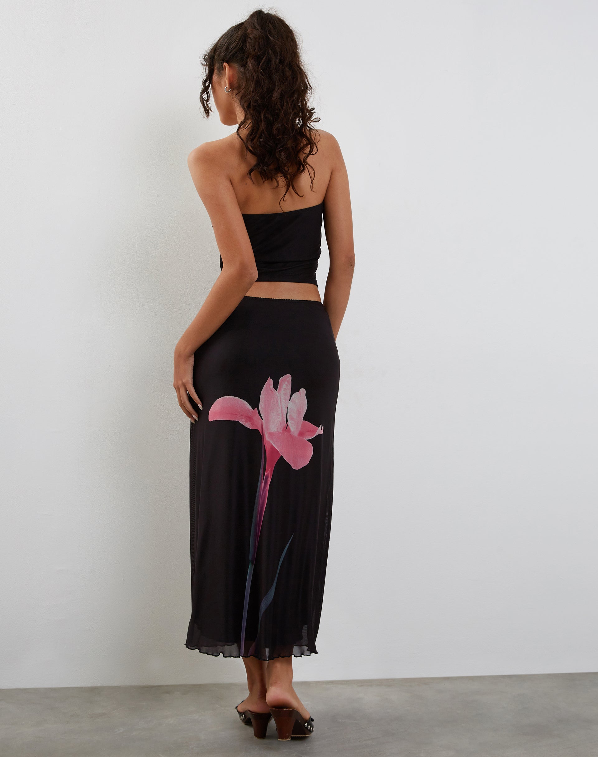 Pink and shop black midi skirt