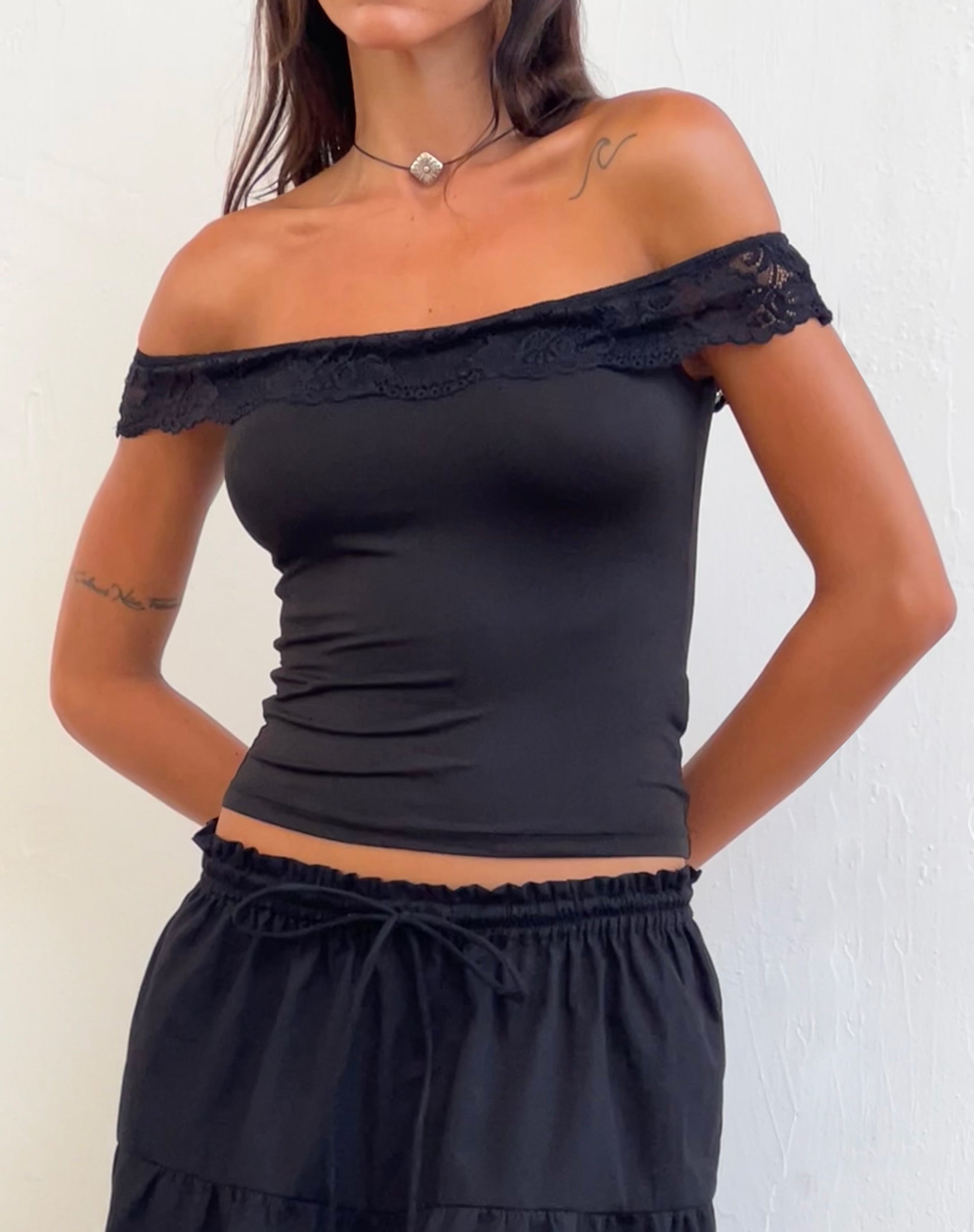 Black ruffle best sale bardot top