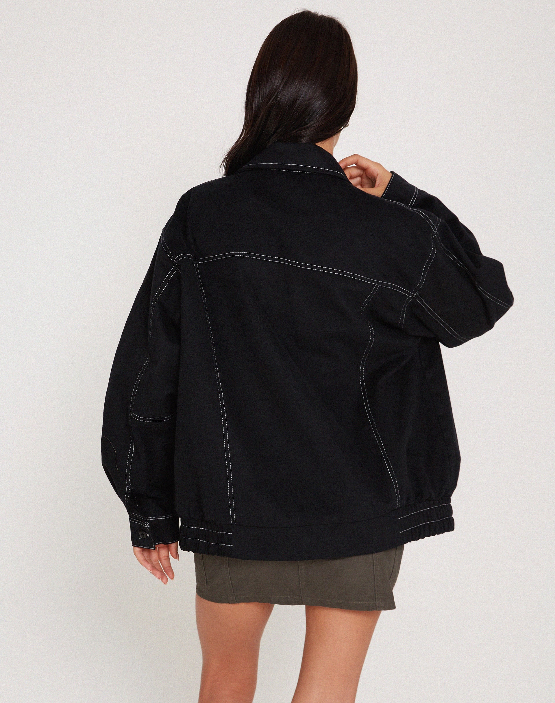 Black jacket best sale with white stitching