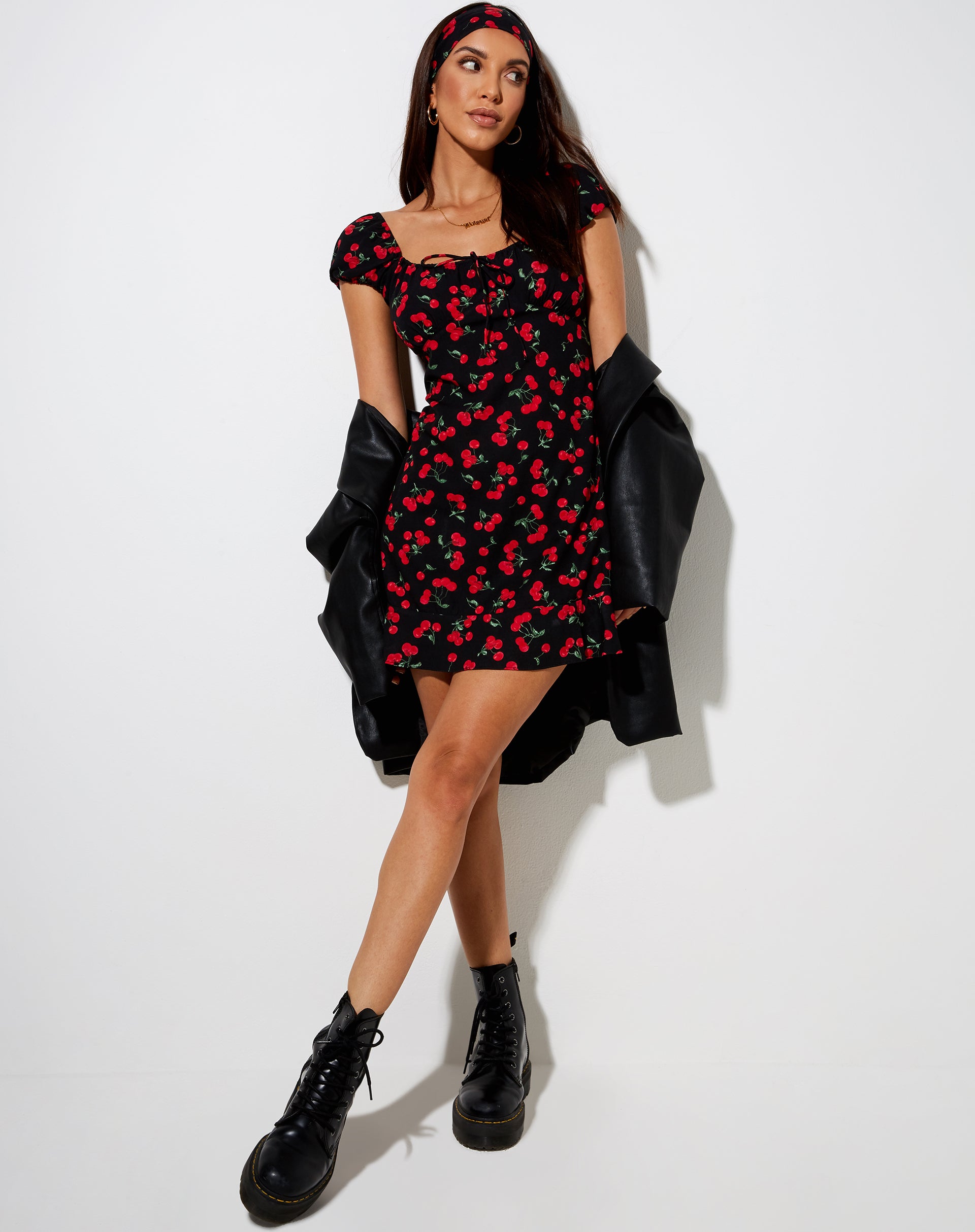 Black dress deals with red cherries