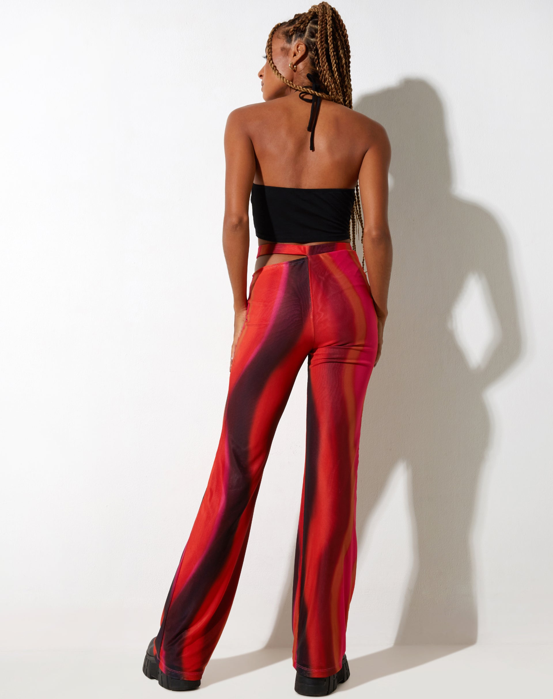 Orange store flare trousers