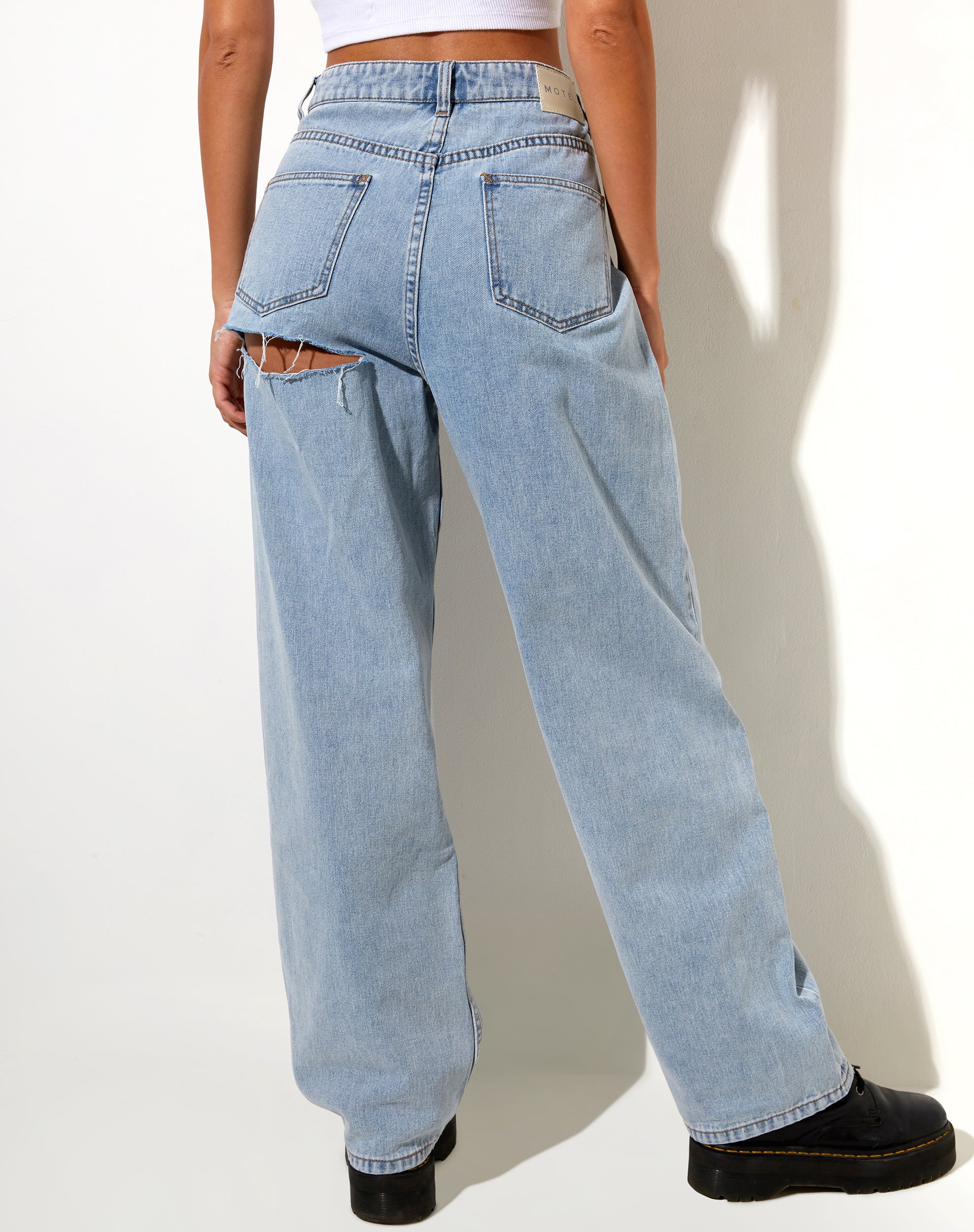 Jeans with the hot sale rip under bum