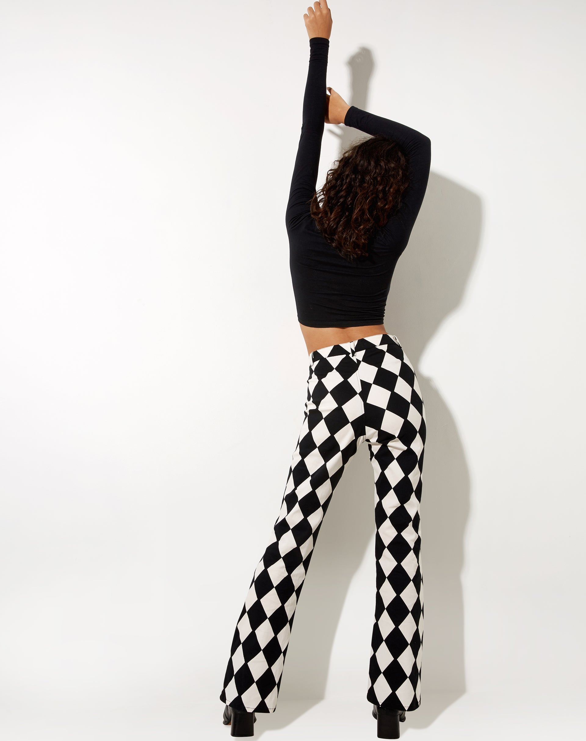 Black and White Harlequin Checkered Flare Trousers | Zoven