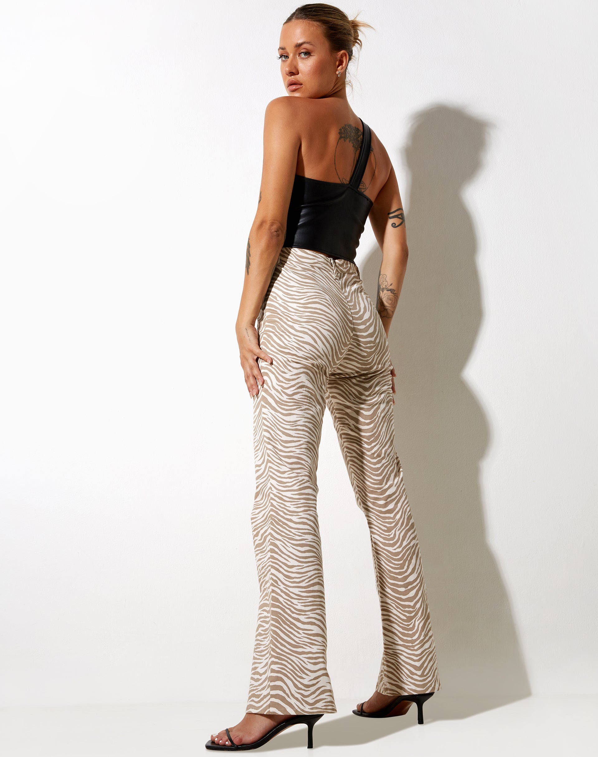 High Waisted Tonal Zebra Print Flared Trousers | Zoven